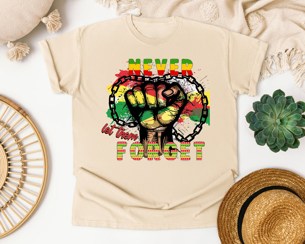 Never Let Them Forget Fist graphic tee in Ivory Comfort Colors 1717