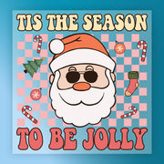 InkMerge’s “Tis The Season To Be Jolly Santa Humor” features a cool cartoon Santa in sunglasses and hat, surrounded by Christmas decorations on a pink and blue checkered background—great for holiday heat press transfers or DTF projects.