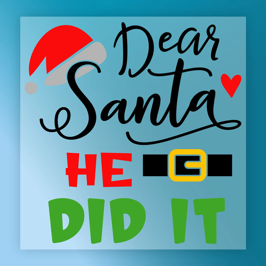 The InkMerge “Humor Santa Holiday” DTF transfer features a blue square sign with "Dear Santa" in black script, a red Santa hat, red heart, "HE" in red, cartoon belt with yellow buckle, and “DID IT” in green—ready to press!.