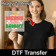 A smiling woman in a black shirt holds the InkMerge Merry and Bright Ornament Design DTF transfer, featuring red and green text on premium DTF film with a checkered background. An arrow points to the "Ready To Press" heat press transfer.