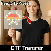 A woman smiles holding an InkMerge Retro Cat Silhouette Sunset DTF Transfer—8-Pass, Hot Peel, Ready to Press. An arrow points from the transfer to her plain black t-shirt. Text reads Ready To Press and DTF Transfer.