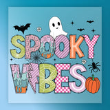 The image is a colorful and whimsical illustration featuring the text "SPOOKY VIBES" surrounded by various Halloween-themed elements such as a ghost, bats, a spider, a pumpkin, and a spider.