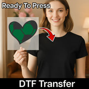 A woman holding a transparent sheet with a heart-shaped sticker on it, and there is a red arrow pointing to the heart-shaped sticker.
