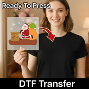 A smiling woman in a black shirt holds a transparent sheet featuring InkMerge’s Cheerful Santa Claus Christmas Design - Heat Press Ready DTF transfer. An arrow points to her shirt with text: Ready To Press & Direct-to-Film transfer.