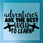 InkMerge’s "Adventures Are The Best Way To Learn" features white text on a blue background with two airplane illustrations, perfect for garment printing using DTF transfer or heat press.