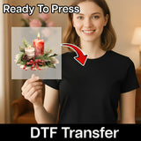 A woman in a black shirt holds a sheet with InkMerge's Christmas Candle Watercolor Design - Heat Press Ready. An arrow points from the sheet to her shirt. Text reads "Ready To Press" and "Screen Printing Alternative for Custom Apparel Transfers.