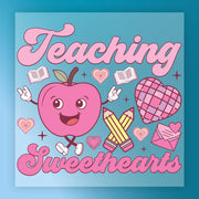 The image is a colorful illustration featuring a smiling apple character surrounded by various heart-shaped objects, pencils, and other school-related items. The text "Teaching Sweethearts" is prominently displayed, suggesting a playful and affectionate theme related to teaching and education.