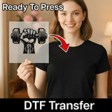 A woman holding a transparent sign with a graphic of a hand holding a dumbbell, with a red arrow pointing to her chest.