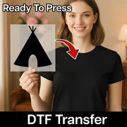 A woman holding a sign with a graphic of a teepee on it, and there is a red arrow pointing to the teepee on her shirt.