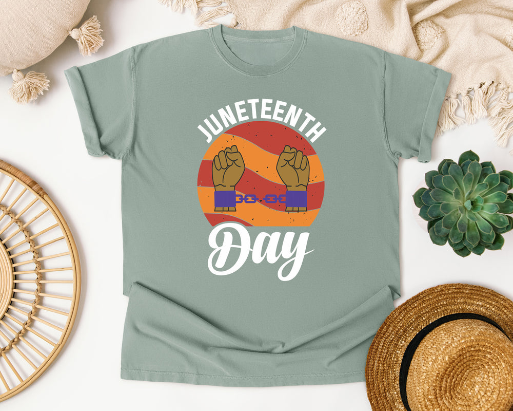 Juneteenth Day Raised Fists graphic tee in Bay Comfort Colors 1717