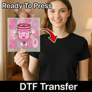 A woman holding a transparent image of a cartoon character with a pink cup, and there is text that says "Ready To Press" and "DTF Transfer" below the image.