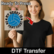 A woman holding a sign with the text "MY HEART IS ON THAT COURT" and a red arrow pointing to the sign.