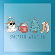 InkMerge's Sweater Weather Festive Design features Santa in sunglasses and beanie, hot cocoa, a festive tree, and cozy socks with "Sweater Weather" text on blue—ideal for DTF transfer or heat press projects.