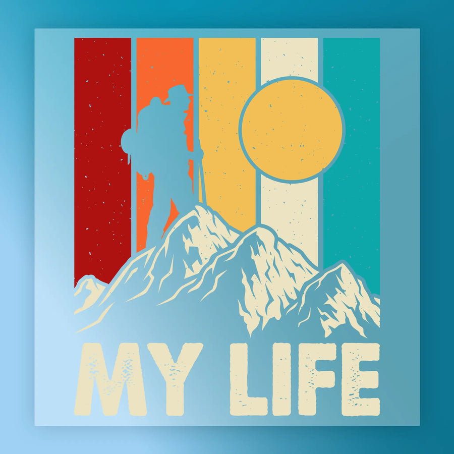 Featuring InkMerge’s Retro Vertical Stripes Design, this DTF transfer shows a hiker silhouette with a backpack on a mountain peak, framed by a large sun and stripes. "MY LIFE" is at the bottom. Precut and ready to press for easy application.