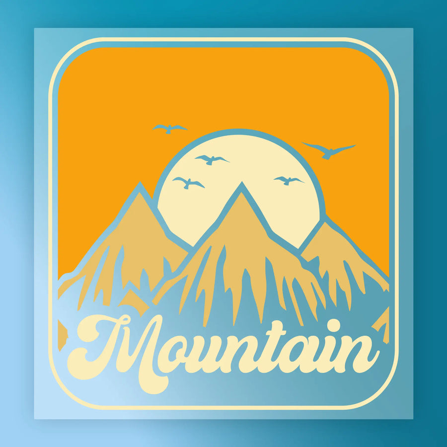 Retro-style minimalist landscape featuring three mountains, a rising sun, birds, and "Mountain" in bold script. Vibrant orange, yellow, and blue colors. Mountain Sunset Minimalist Landscape by InkMerge—DTF transfer, ready to press.