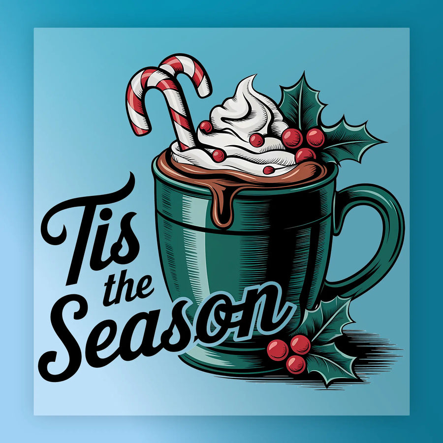 The "Tis the Season Cocoa Design" by InkMerge features a green mug of hot chocolate with whipped cream, two candy canes, and holly on a blue background—ideal for heat press or DTF transfer on premium DTF film.