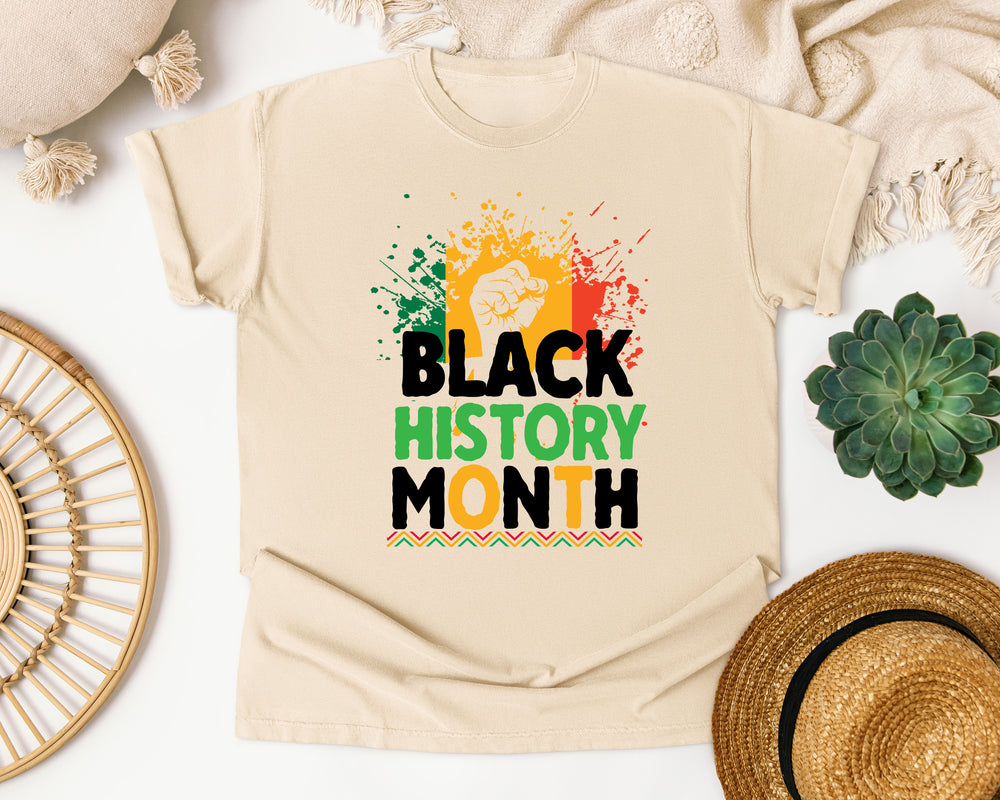 Black History Month Fist graphic tee in Ivory Comfort Colors 1717