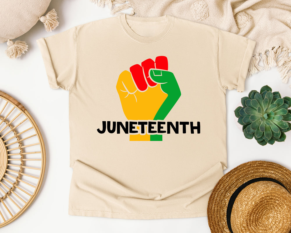 Juneteenth Fist graphic tee in Ivory Comfort Colors 1717