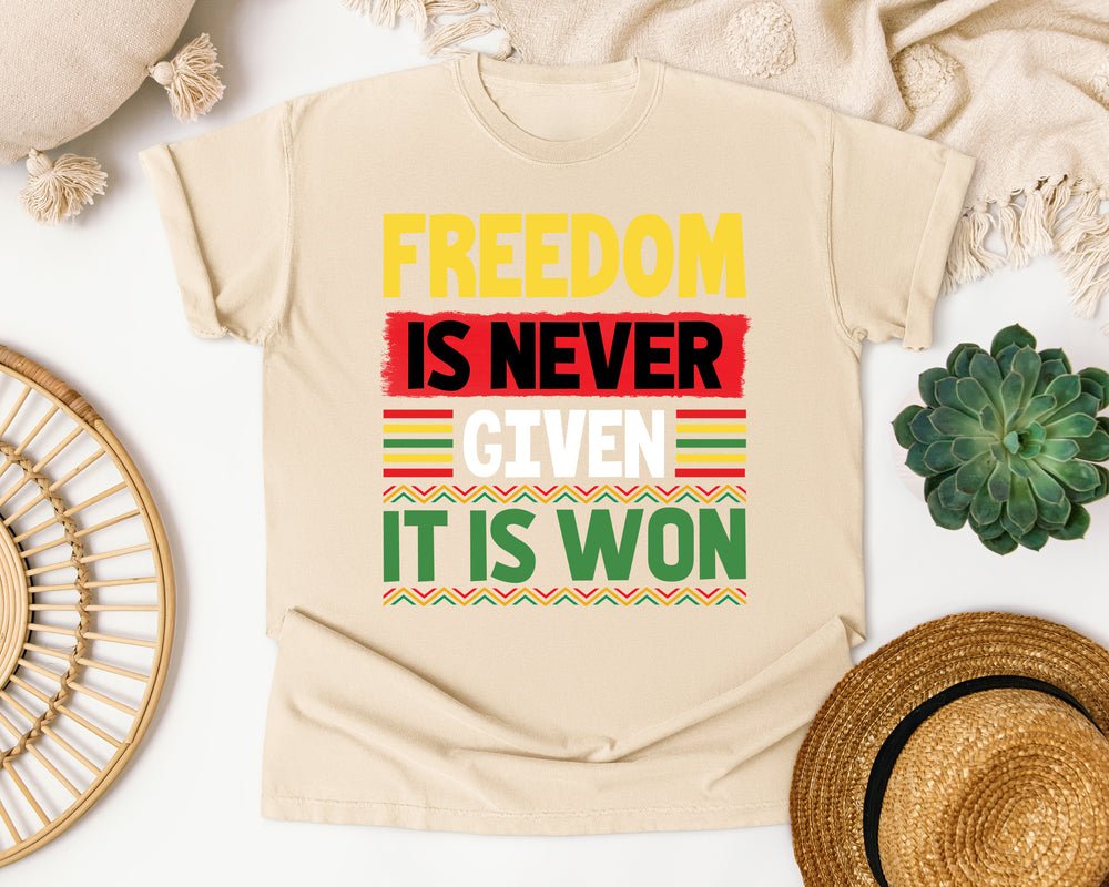 Freedom Is Never Given Won graphic tee in Ivory Comfort Colors 1717