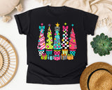 Whimsical Christmas Tree Lineup graphic tee in Black Comfort Colors 1717