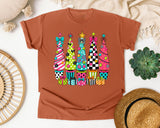 Whimsical Christmas Tree Lineup graphic tee in Yam Comfort Colors 1717