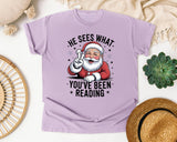 He Sees What You've Been Reading graphic tee in Orchid Comfort Colors 1717