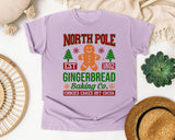 North Pole Gingerbread Baking Co graphic tee in Orchid Comfort Colors 1717