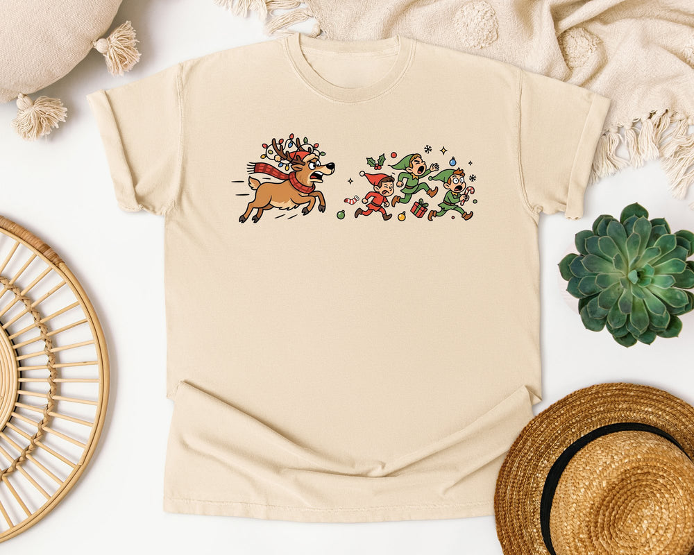 Reindeer Chasing Elves graphic tee in Ivory Comfort Colors 1717