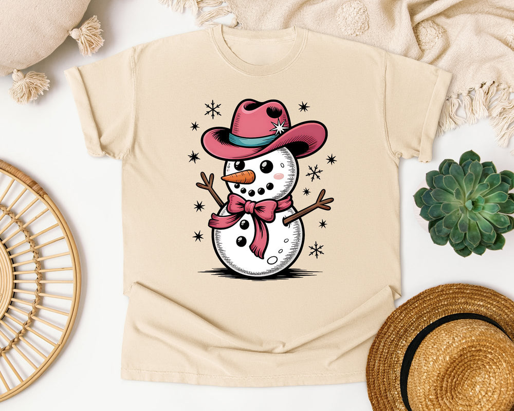 Pink Cowboy Snowman graphic tee in Ivory Comfort Colors 1717