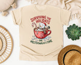 Surviving the Holidays One Meltdown at a Time graphic tee in Ivory Comfort Colors 1717