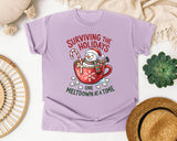 Surviving the Holidays One Meltdown at a Time graphic tee in Orchid Comfort Colors 1717
