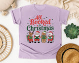 All Booked for Christmas graphic tee in Orchid Comfort Colors 1717