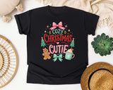 Cozy Christmas Cutie graphic tee in Black Comfort Colors 1717