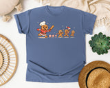 Gingerbread Chef Chasing Cookies graphic tee in Blue Jean Comfort Colors 1717
