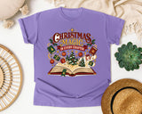 Christmas Magic in Every Chapter graphic tee in Violet Comfort Colors 1717