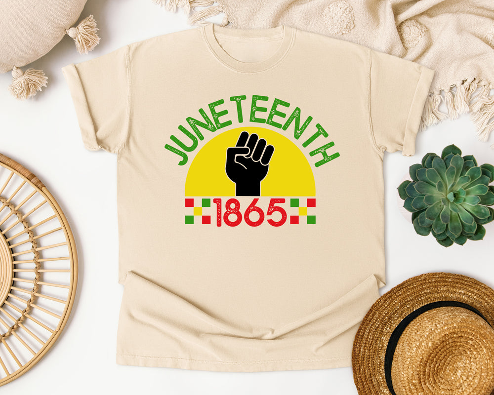 Juneteenth 1865 Fist Sunburst graphic tee in Ivory Comfort Colors 1717